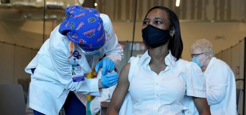 BLACKS, LATINOS VACCINATED AT LOWER RATES THAN WHITES IN US