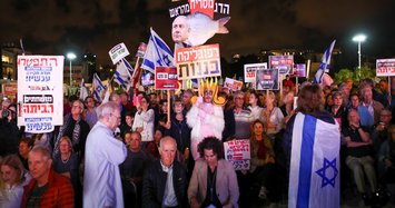 Thousands of Israeli protesters call on indicted PM to resign