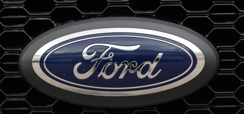 FORD LAYS OFF 7,000 WHITE-COLLAR EMPLOYEES