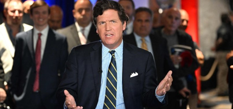 FOX NEWS AND TUCKER CARLSON PART WAYS AFTER FOX SETTLES DOMINION LAWSUIT