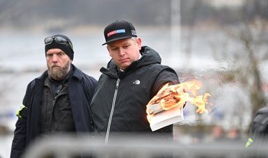 Danish far-right leader Rasmus Paludan burns copy of Quran in Swedish capital Stockholm