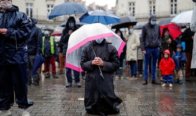 French Catholics hold open air mass to protest against COVID-19 restrictions