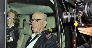 UK refers Murdoch's SKY bid to trade watchdog