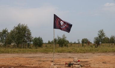 Wagner 'skull' flag flies over empty Prigozhin plane crash site in Russia