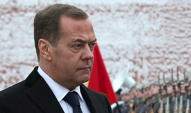 Russia's Medvedev calls protesters at polling stations 'traitors'