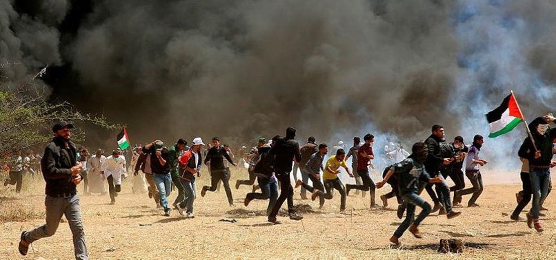 DESPITE WARNINGS, GAZANS RETURN TO TENSE ISRAEL BORDER
