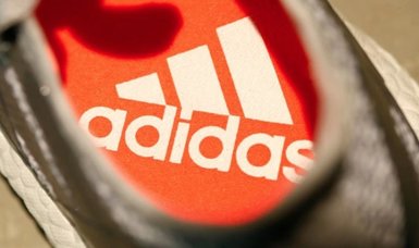 Adidas halves FY income outlook after Kanye West split