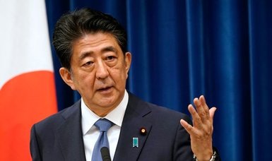Japan’s ex-premier Abe survives dinner parties scandal