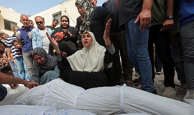 Dozens of Palestinians killed in Israeli raids on Gaza Strip