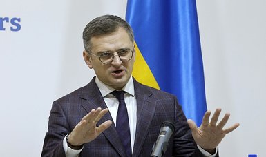 Ukraine's foreign minister says he believes US aid will come