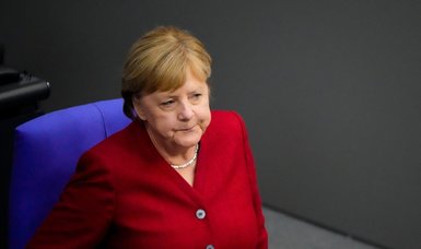 Ex-chancellor Merkel scolded by German court for political comments