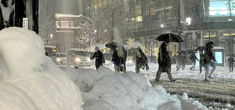 REPORTS: AT LEAST EIGHT DEAD AS SNOW SMOTHERS SWATHES OF JAPAN
