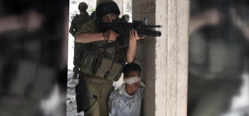 Palestinian civilian used by Israeli soldiers in conflict-hit Gaza Strip as human shield - footage