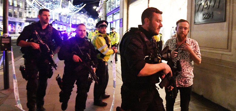 FACES GUNFIRE ALARM AT LONDONS OXFORD CIRCUS SUBWAY STATION SPARKS PANIC
