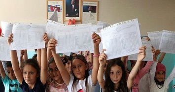 Summer beckons as Turkish students wave school goodbye