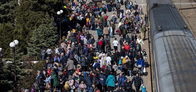 Civilians flee eastern Ukraine after deadly railway station attack