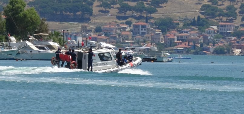 TURKISH COASTGUARD RESCUES 35 MIGRANTS FROM HALF-SUNKEN BOAT IN AEGEAN SEA