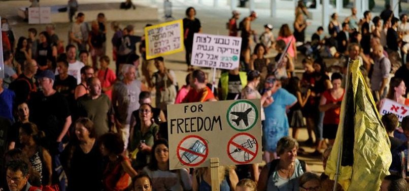 ISRAELIS PROTEST AS RISING COVID CASES TRIGGER NEW RULES
