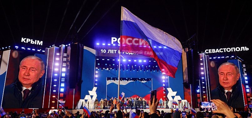 ON RED SQUARE, PUTIN VOTERS BASK IN PREDICTABLE VICTORY