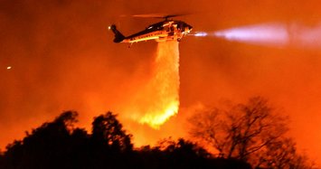 Thousands told to evacuate as wildfires spread in California