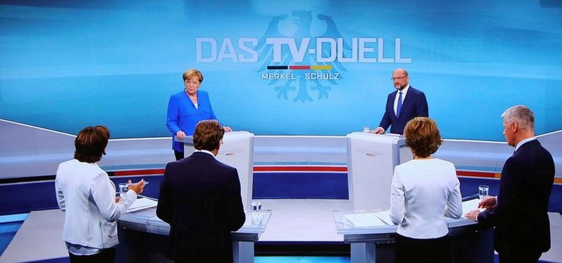 MERKEL, SCHULZ CLASH ON POLICY IN PRE-ELECTION TV DUEL