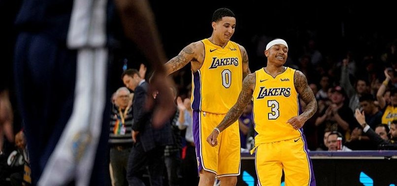 THOMAS RALLIES LAKERS PAST NUGGETS 112-103
