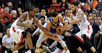 Warriors finish strong against Raptors to even series