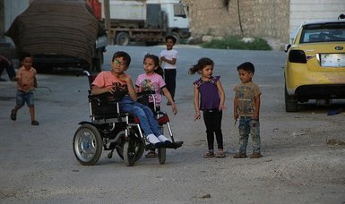 Syrian boy left paralyzed by Assad regime eyes treatment in Turkey