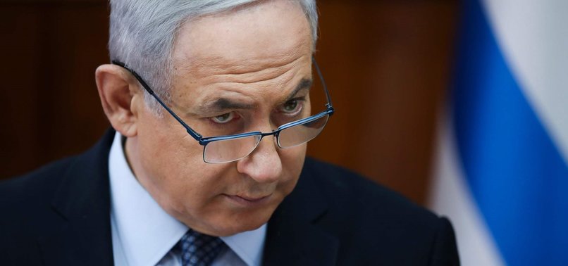 NETANYAHU GIVES UP MINISTERIAL POSTS OVER CORRUPTION CHARGES
