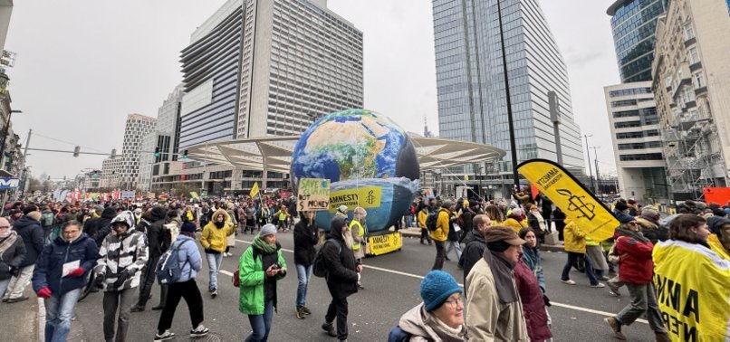 THOUSANDS HOLD CLIMATE RALLY IN BRUSSELS AS COP28 TALKS UNDERWAY