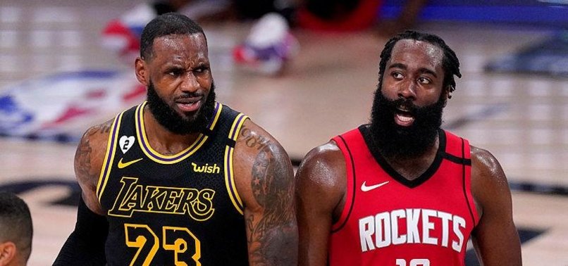 LOS ANGELES LAKERS HOLD OFF HOUSTON ROCKETS TO EVEN SERIES