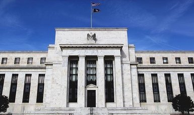 Fed keeps interest rate unchanged, signaling hike soon