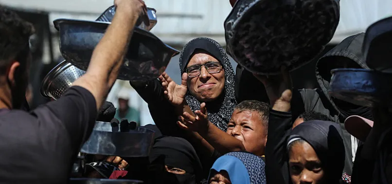 WORLD FOOD PROGRAM CHIEF CALLS GAZA HUNGER UNACCEPTABLE; VOWS TO PROTECT AID WORKERS