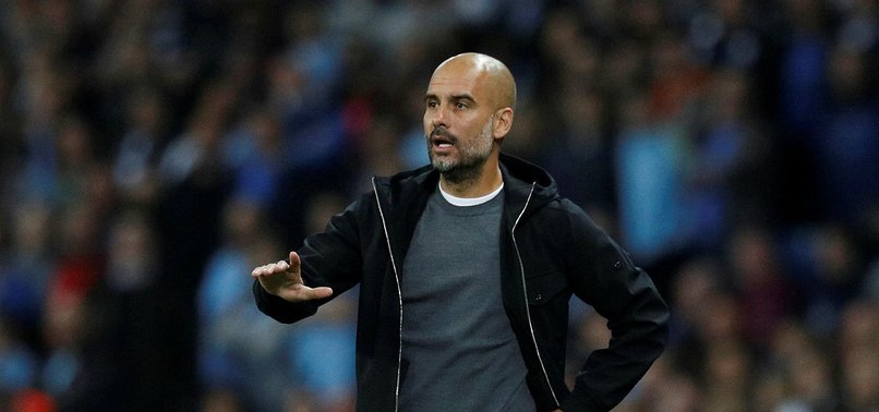 GUARDIOLA REVEALS SPAIN AMBITION