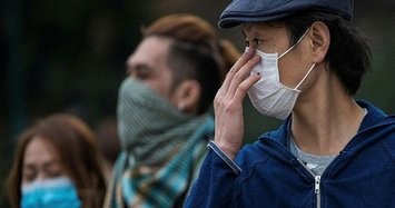 Hong Kong to ban entry of people from virus outbreak province