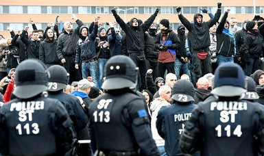 German police carry out dozens of dawn raids on far right crime network
