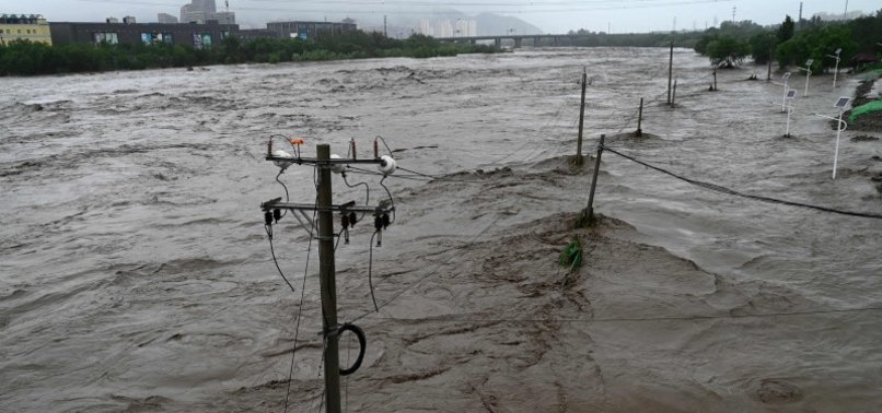 FLASHFLOODS KILL 7 IN SOUTHWESTERN CHINA, DEATH TOLL CLIMBS TO 33 IN BEIJING DOWNPOUR