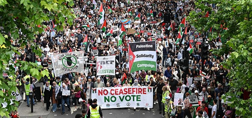 ‘WE DO NOT VOTE FOR THOSE WHO NORMALIZE MASSACRES: THOUSANDS JOIN PRO-PALESTINIAN PROTEST MARCH IN LONDON