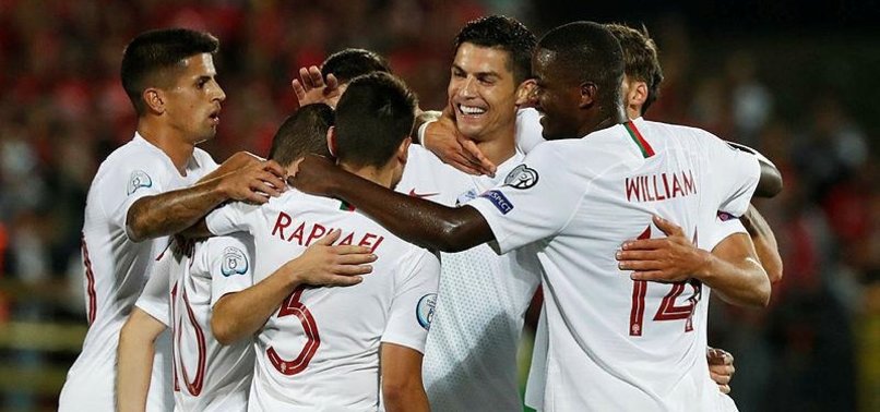 RONALDO HITS FOUR AGAINST LITHUANIA TO TAKE PORTUGAL TALLY TO 93