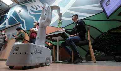 Tech giant Google demos soda-fetching robots