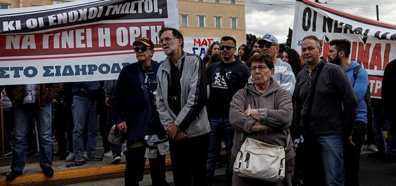 GREEKS RALLY OVER TRAIN CRASH, LABOUR UNIONS GEAR FOR MORE WALKOUTS