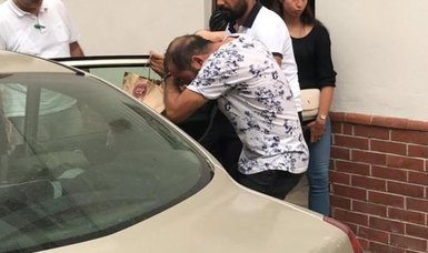 Neighbors arrested in car theft case following security camera footage investigation