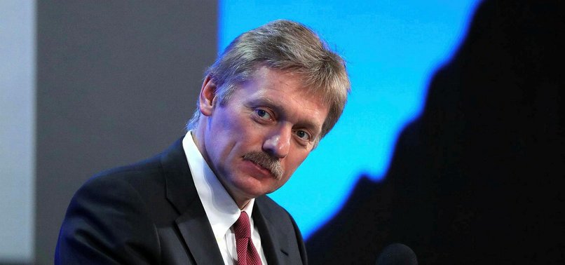 KREMLIN VOWS TO RESPOND TO DIPLOMATIC EXPULSIONS