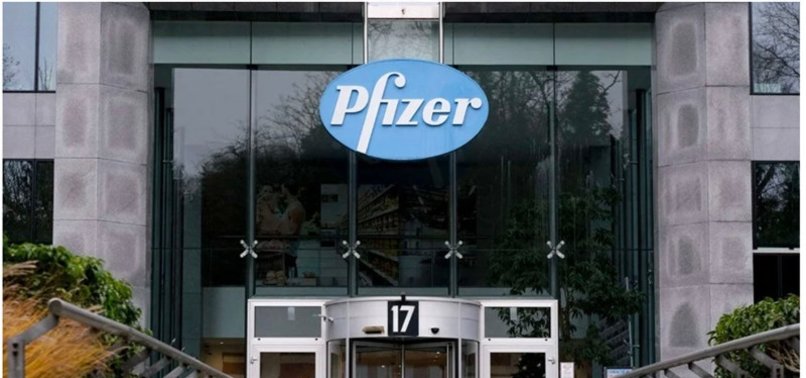 VACCINE MAKER PFIZER POSTS RECORD REVENUES, SEES SLOWER 2023