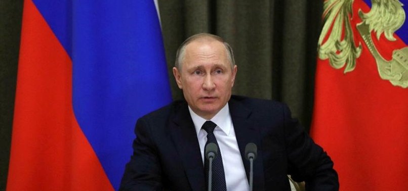 VLADIMIR PUTIN DENIES RUSSIAN STATE INVOLVEMENT IN HACKING