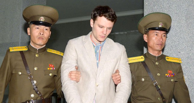 Otto Frederick Warmbier (C), a University of Virginia student who was detained in North Korea since early January, is taken to North Korea's top court in Pyongyang, North Korea, in this photo released by Kyodo March 16, 2016. (REUTERS Photo)