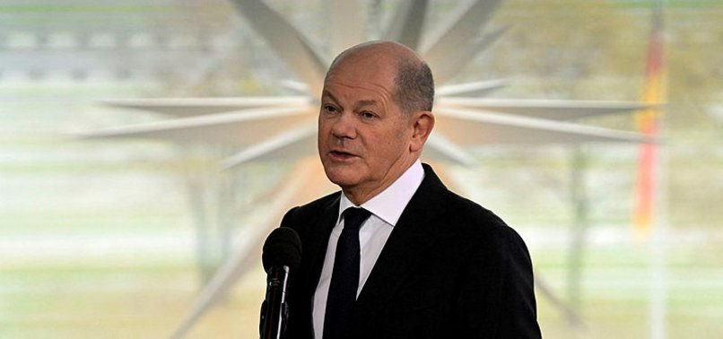 GERMAN CHANCELLOR SCHOLZ SAYS HE WILL CONTINUE TO TALK TO PUTIN