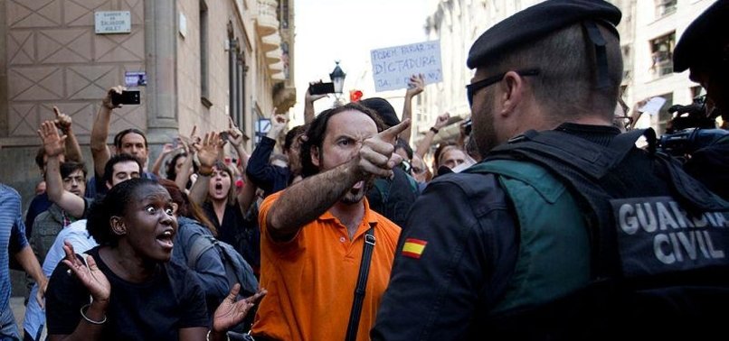 SPANISH POLICE ARREST CATALAN OFFICIALS OVER SECESSION VOTE