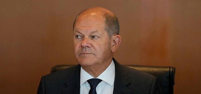 SCHOLZ CALLS ON GERMANS TO STICK TOGETHER TO FACE ECONOMIC PROBLEMS
