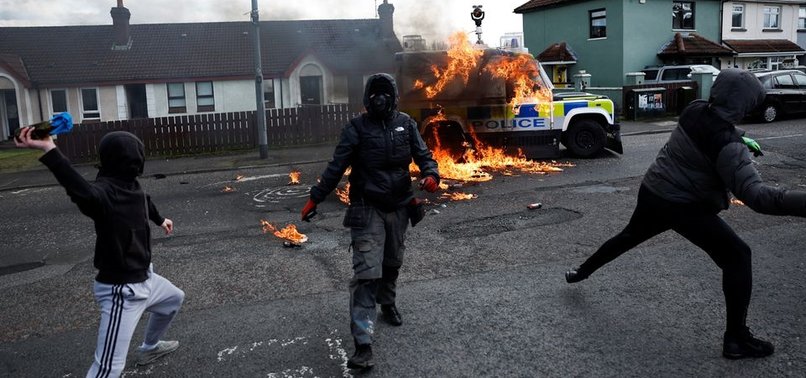 PETROL BOMBS THROWN AT NORTHERN IRISH POLICE ON EVE OF BIDEN VISIT